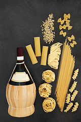 Image showing Assorted Italian Pasta and Traditional Red Wine 