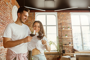 Image showing Young couple moved to a new house or apartment