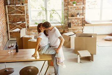 Image showing Young couple moved to a new house or apartment