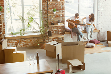 Image showing Young couple moved to a new house or apartment