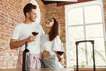 Image showing Young couple moved to a new house or apartment