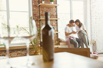 Image showing Young couple moved to a new house or apartment