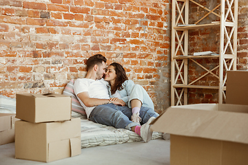 Image showing Young couple moved to a new house or apartment