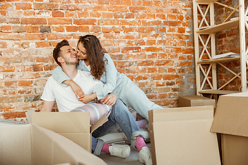 Image showing Young couple moved to a new house or apartment