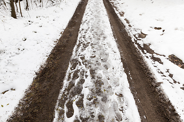 Image showing Rural Dirt road with snow