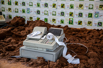 Image showing Old cash register with cash register tape. 