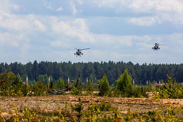 Image showing Fighting helicopters in military training Saber Strike in Latvia