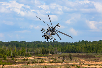 Image showing Fighting helicopter in military training Saber Strike in Latvia.