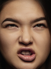 Image showing Close up portrait of young emotional woman