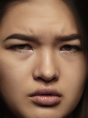 Image showing Close up portrait of young emotional woman
