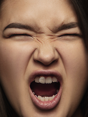 Image showing Close up portrait of young emotional woman