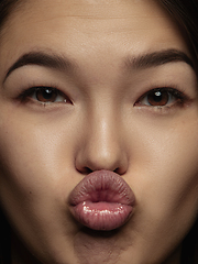 Image showing Close up portrait of young emotional woman