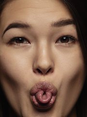 Image showing Close up portrait of young emotional woman