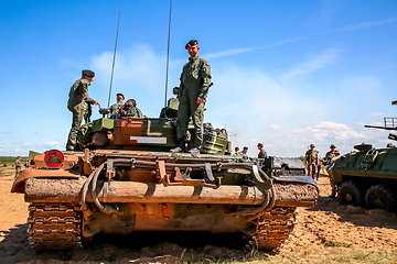 Image showing Soldiers on tank in military training Saber Strike in Latvia.