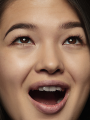 Image showing Close up portrait of young emotional woman