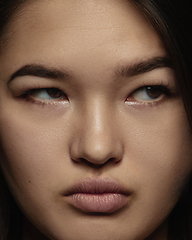 Image showing Close up portrait of young emotional woman