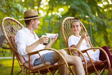 Image showing Happy couple at barbecue dinner on sunset time