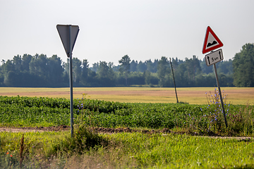 Image showing Road signs next to the rural road.