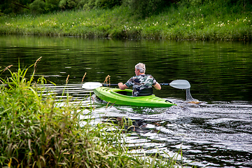 Image showing People boating on river