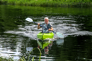 Image showing People boating on river