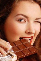 Image showing A girl with a chocolate