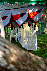 Image showing Life jackets drying in the shed.