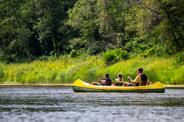 Image showing Family in boat trip by boat on the river.