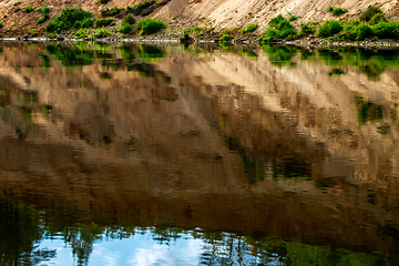 Image showing Landscape with cliff reflection in river.