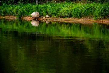 Image showing Landscape of river and reflection of green forest.