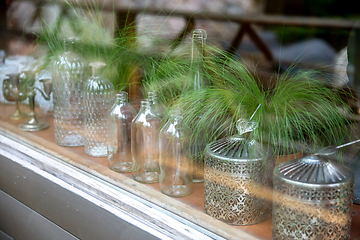 Image showing Weddings interior with empty bottles 