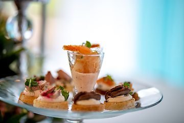 Image showing Shrimp salad and sandwiches on plate.