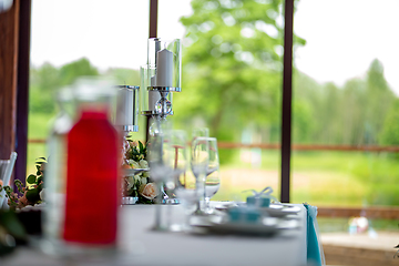 Image showing Candles and dishes on the festive table