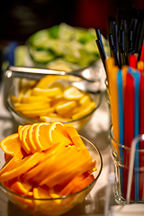 Image showing Orange, lemon and lime slices on the wedding table