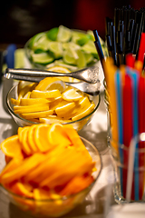 Image showing Orange, lemon and lime slices on the wedding table