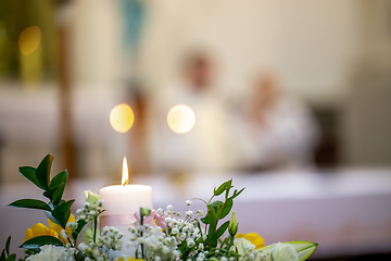 Image showing Bouquet of flowers and candle