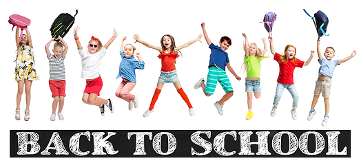 Image showing Group of elementary school kids jumping, back to school