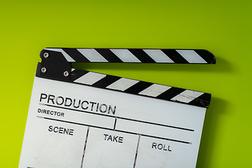 Image showing movie clapper on green  background