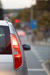 Image showing back of car waiting at the red light