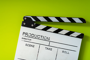 Image showing movie clapper on green  background