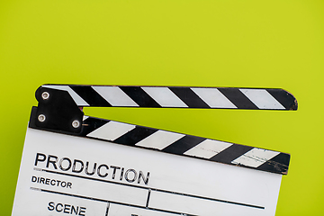 Image showing movie clapper on green  background