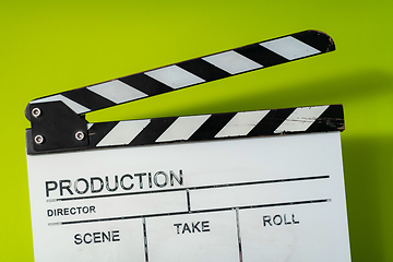 Image showing movie clapper on green  background