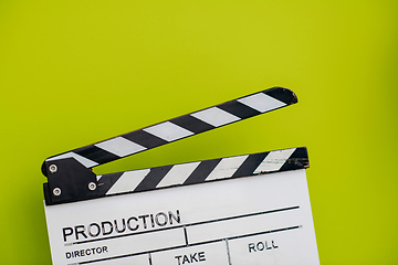 Image showing movie clapper on green  background