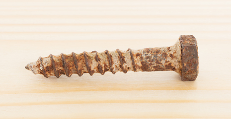 Image showing Rusted old screw isolated