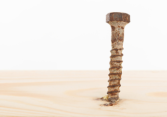 Image showing Rusted old screw isolated