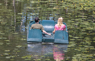 Image showing Unrecognisable people in a watercycle