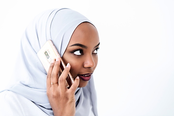 Image showing african business woman using smartphone