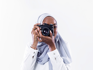 Image showing african modern muslim woman using retro camera
