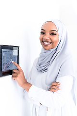 Image showing african woman using smart home screen