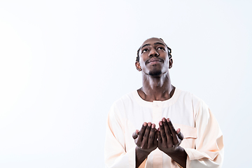 Image showing african man pray to Allah