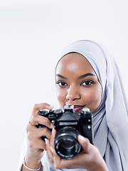 Image showing african modern muslim woman using retro camera